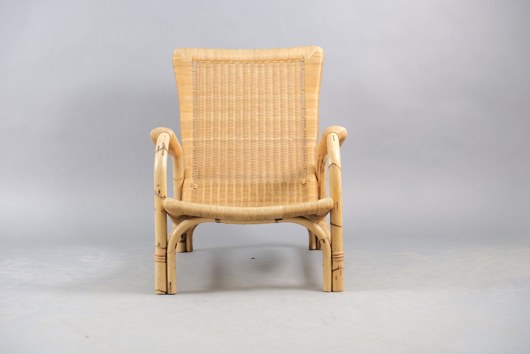 Vintage Rattan Lounge Chair from Arco