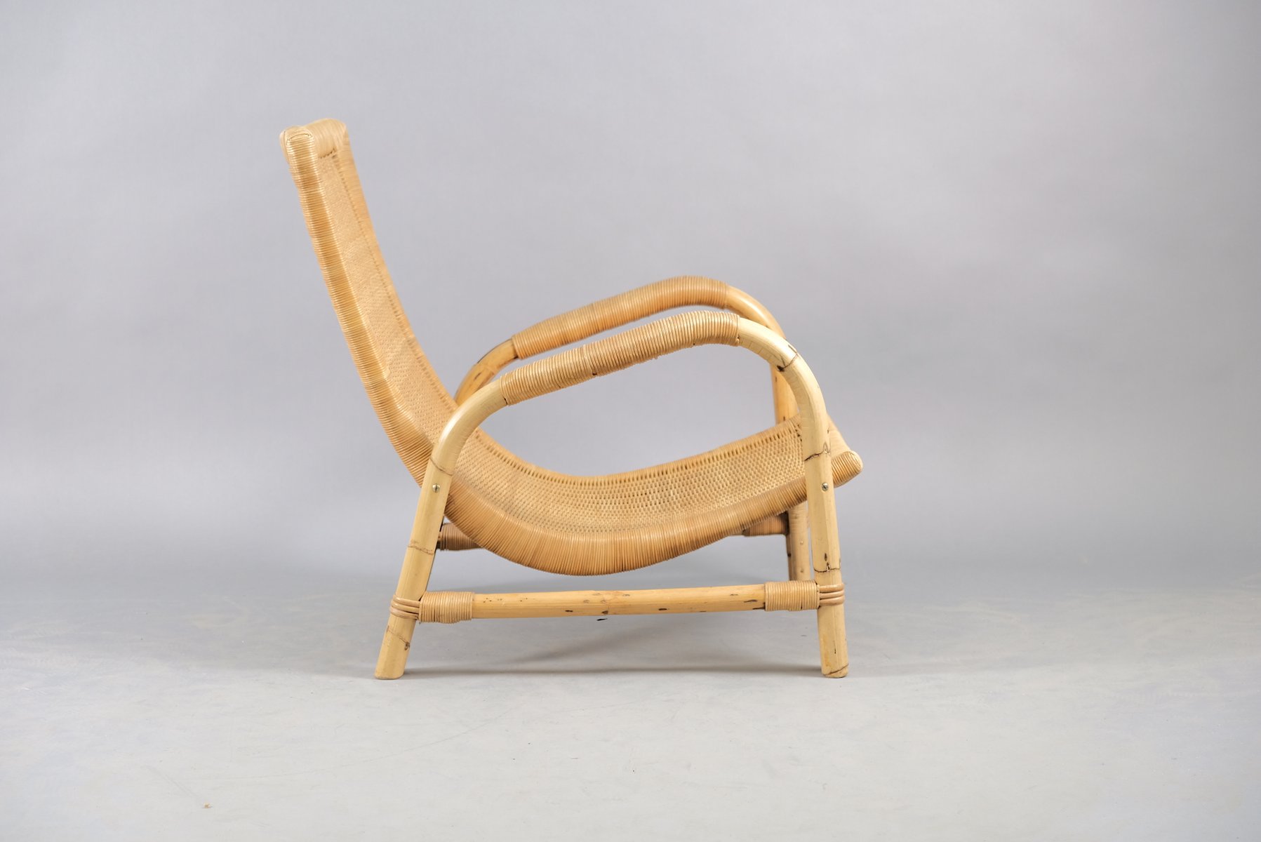 Vintage Rattan Lounge Chair from Arco