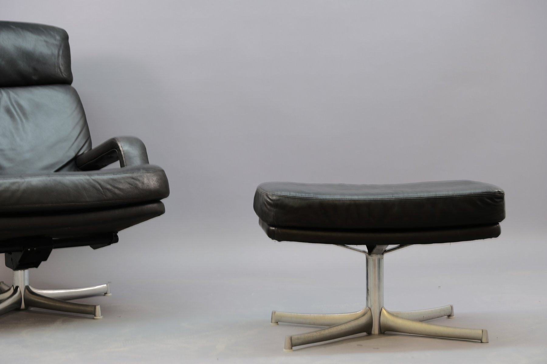 Vintage Sessel & Fußhocker Set mit Lederbezügen von Bernd Münzebrock für Walter Knoll / Wilhelm Knoll, 1970er